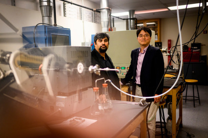 In a research paper, Mechanical and Industrial Engineering Professors Moneesh Upmanyu, left, and Yung Joon Jung describe a novel process of  producing highly dense and vertically aligned ultra-narrow silicon nanowires via a catalyst-free chemical vapor etching process. Photo by Matthew Modoono/Northeastern University