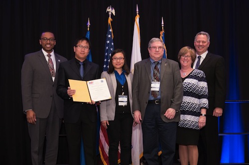 CAPTION From left: John Robinson, Senior Cyber Security Advisor at the Department of Homeland Security; Bo Luo, Associate Professor, EECS; Fengjun Li, Assistant Professor, EECS; Victor Frost, Dan F. Servey Distinguished Professor and Chair; Dr. Joan Ferrini-Mundy, Assistant Director, Directorate of Education and Human Resources, National Science Foundation (NSF); Clif Triplett, Senior Cyber and Information Technology Advisor, U.S. Office of Personnel Management.