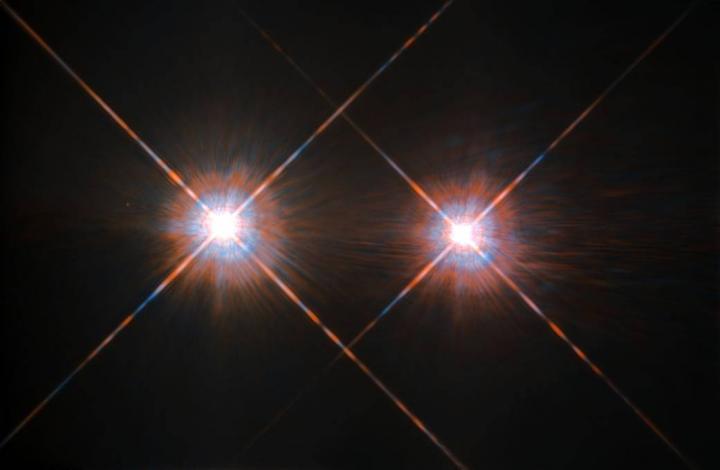 CAPTION The Alpha Centauri group is the closest star - or solar - system outside of our own at a distance of 4.3 lightyears, and it can be found in the night sky in the constellation Centaurus. The stars Alpha Centauri A and Alpha Centauri B comprise a binary system, in which the two stars orbit one another, and close by is an additional faint red dwarf Alpha Centauri C, also called Proxima Centauri. Some astronomers have hoped to someday find an exoplanet capable of harboring advanced life in the system, but a new study lowers those expectations while raising them for the rest of the universe.  CREDIT NASA/ESA Hubble Space Telescope