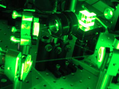 This is a photograph of the preparation setup for the strong green pump laser used for enhancing the nonlinearity for coherent photonic conversion.