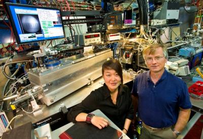 Mi-Young Im and Peter Fischer of Berkeley Lab’s Center for X-Ray Optics led a study at the Advanced Light Source in which it was discovered that the formation of magnetic vortices in ferromagnetic nanodisks is an asymmetric phenomenon.  Credit: Photo by Roy Kaltschmidt, Berkeley Lab