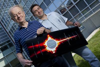 Federico Capasso (left), Patrice Genevet (right), and an international team of colleagues have demonstrated a new type of tightly controlled light wave that could eliminate signal loss in on-chip optical devices.  Credit: Photo by Eliza Grinnell, Harvard SEAS Communications.