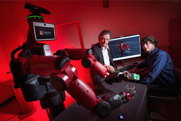 University of Maryland computer scientist Yiannis Aloimonos (center) is developing robotic systems able to visually recognize objects and generate new behavior based on those observations.   Credit  John T. Consoli