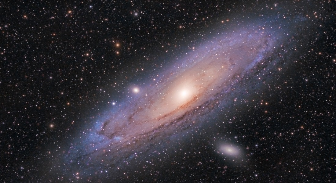 The Andromeda galaxy, our Milky Way's closest neighbor, is the most distant object in the sky that you can see with your unaided eye. Photo: Getty