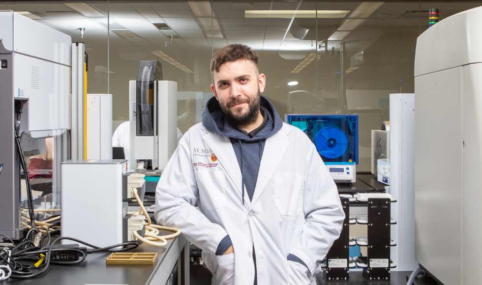 Jonathan Stokes, who is an assistant professor in the Department of Biomedicine & Biochemistry at McMaster University, led a research team that has developed a new AI model called SyntheMol. The model is capable of designing new antibiotics that can halt the spread of Acinetobacter baumannii. A photo of Jonathan Stokes during the research work was taken by Georgia Kirkos at McMaster University.