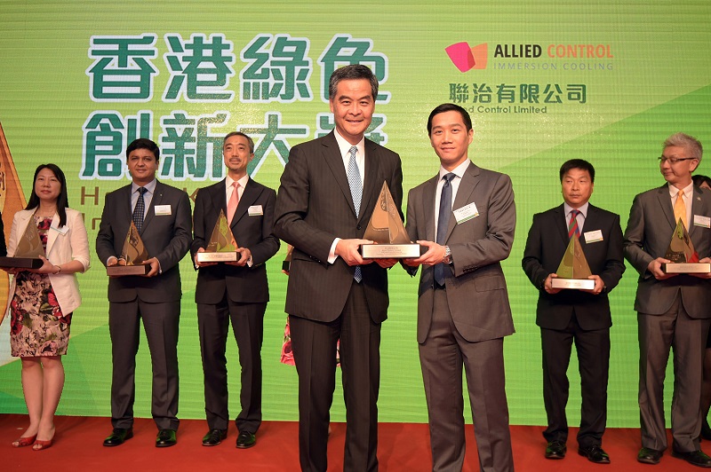 Kar-Wing Lau, VP of Operations at Allied Control with an award. 