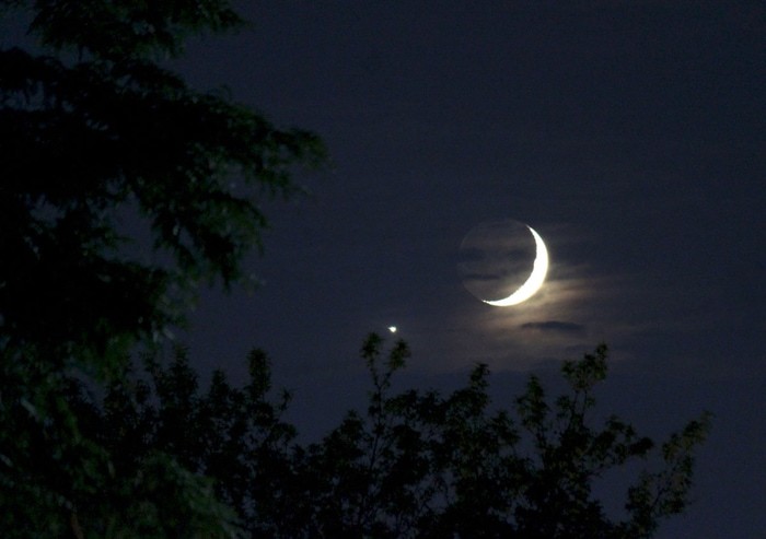 Bright Venus seen near the crescent moon.  CREDIT NASA/Bill Dunford