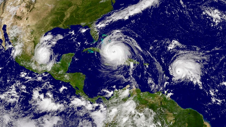 A satellite image from the National Oceanic and Atmospheric Administration captures an active hurricane season which included Hurricanes Katia and Irma and Tropical Storm Jose (from left to right) on September 8, 2017  CREDIT NOAA