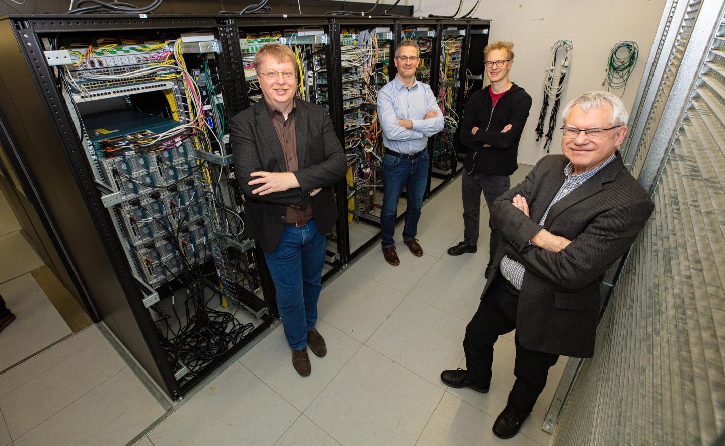 CAPTION For the de.NBI, they are coordinating supercomputing power and services for bioinformatics in Germany (from left to right): Professor Dr Andreas Tauch, Professor Dr Alexander Sczyrba, Professor Dr Jens Stoye, and Professor Dr Alfred Pühler.  CREDIT Photo: Bielefeld University/M.-D. Müller