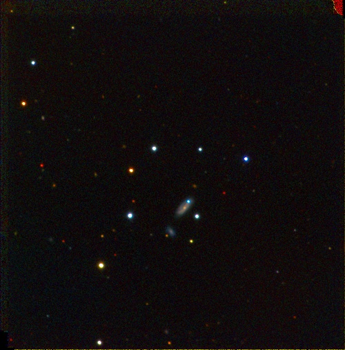 The supernova PTF 11kx can be seen as the blue dot on the galaxy. The image was taken when the supernova was near maximum brightness by the Faulkes Telescope North. The system is located approximately 600 million light years away in the constellation Lynx. (BJ Fulton, Las Cumbres Observatory Global Telescope Network)