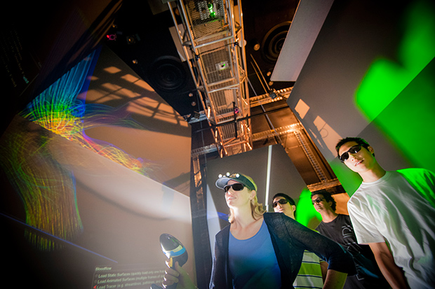 Alison Marsden, a professor of mechanical and aerospace engineering, examines some of the simulations her research group developped in the StarCAVE imaging space on the UC San Diego campus.