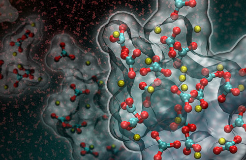 This artistic rendering of a computer simulation shows the formation of a liquid-like particle during the early stages of calcium carbonate crystallization. Image courtesy of Adam F. Wallace/University of Delaware and David J. Carey