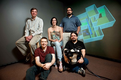 From left to right, front row on floor, are Eric Ragan and Felipe Bacim. In the back row are Doug Bowman, Cheryl Stinson, and Siroberto Scerbo.