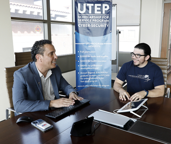 The University of Texas at El Paso will enhance the capacity of the regional and national cybersecurity workforce, thanks to a a $4 million grant from the National Science Foundation and the Department of Homeland Security in support of the CyberCorps Scholarship for Service (SFS) program. Salamah Salamah, Ph.D., associate professor and chair of UTEP’s Department of Computer Science, left, oversees the program and is seen here counseling David Reyes, a doctoral candidate who has been part of the SFS program since its inception.  CREDIT Laura Trejo/UTEP Marketing and Communications.