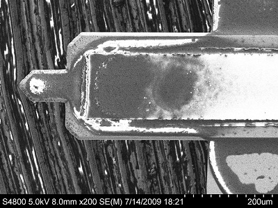 Researchers have learned how to improve the performance of sensors that use tiny vibrating microcantilevers, like the one pictured here, to detect chemical and biological agents for applications from national security to food processing. (Vijay Kumar, Birck Nanotechnology Center, Purdue University)