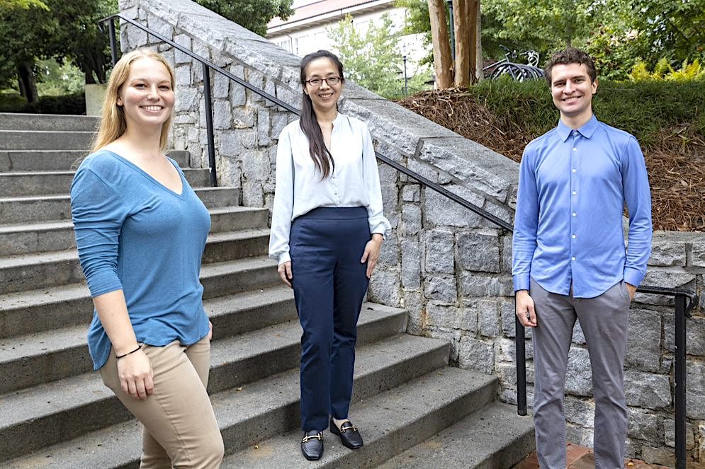 “We've freed the researchers from most of the tedious, manual tasks of data input,” says Emory theoretical chemist Fang Liu (center). Her team members who developed the toolkit include Emory graduate student Ariel Gale (left) and postdoctoral fellow Eugen Husk (right). Not shown is Xiao Huang, who worked on the project as an undergraduate.